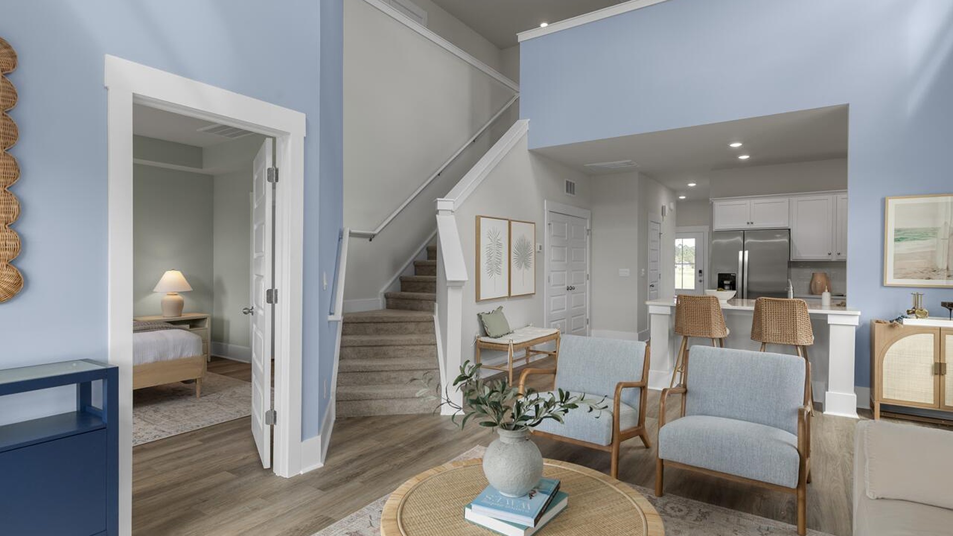 The Marion floorplan features an inviting covered front porch that opens into a formal dining room. The open concept living space is anchored by a spacious kitchen with granite countertops, stainless steel appliances and a large island that overlooks your family and dining room. Ideal for entertaining guests or enjoying family time while preparing meals.