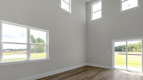 The Marion floorplan features an inviting covered front porch that opens into a formal dining room. The open concept living space is anchored by a spacious kitchen with granite countertops, stainless steel appliances and a large island that overlooks your family and dining room. Ideal for entertaining guests or enjoying family time while preparing meals.