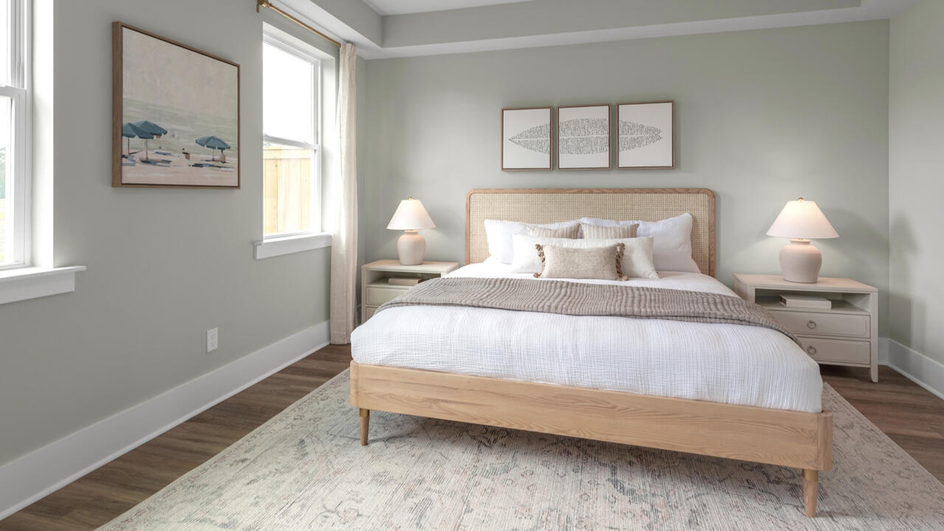 The first-floor primary bedroom boasts a large bath, double vanities and walk-in closet and convenient laundry room. On the second floor, you are greeted by a versatile loft space, two secondary bedrooms, laundry and a full bath.