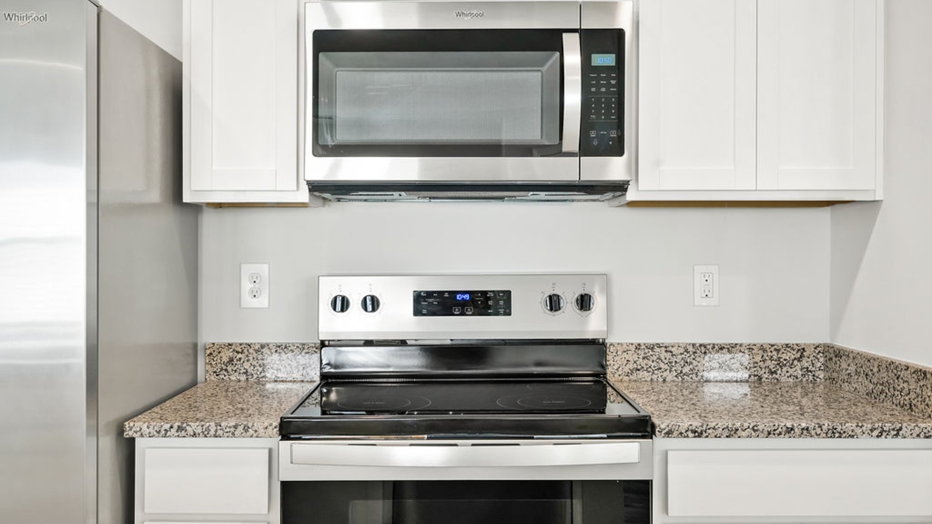 The kitchen features granite countertops, and stainless steel appliances, which are sure to both turn heads and make meal prep easy. You’ll never be too far from the action with the living and dining area right there.