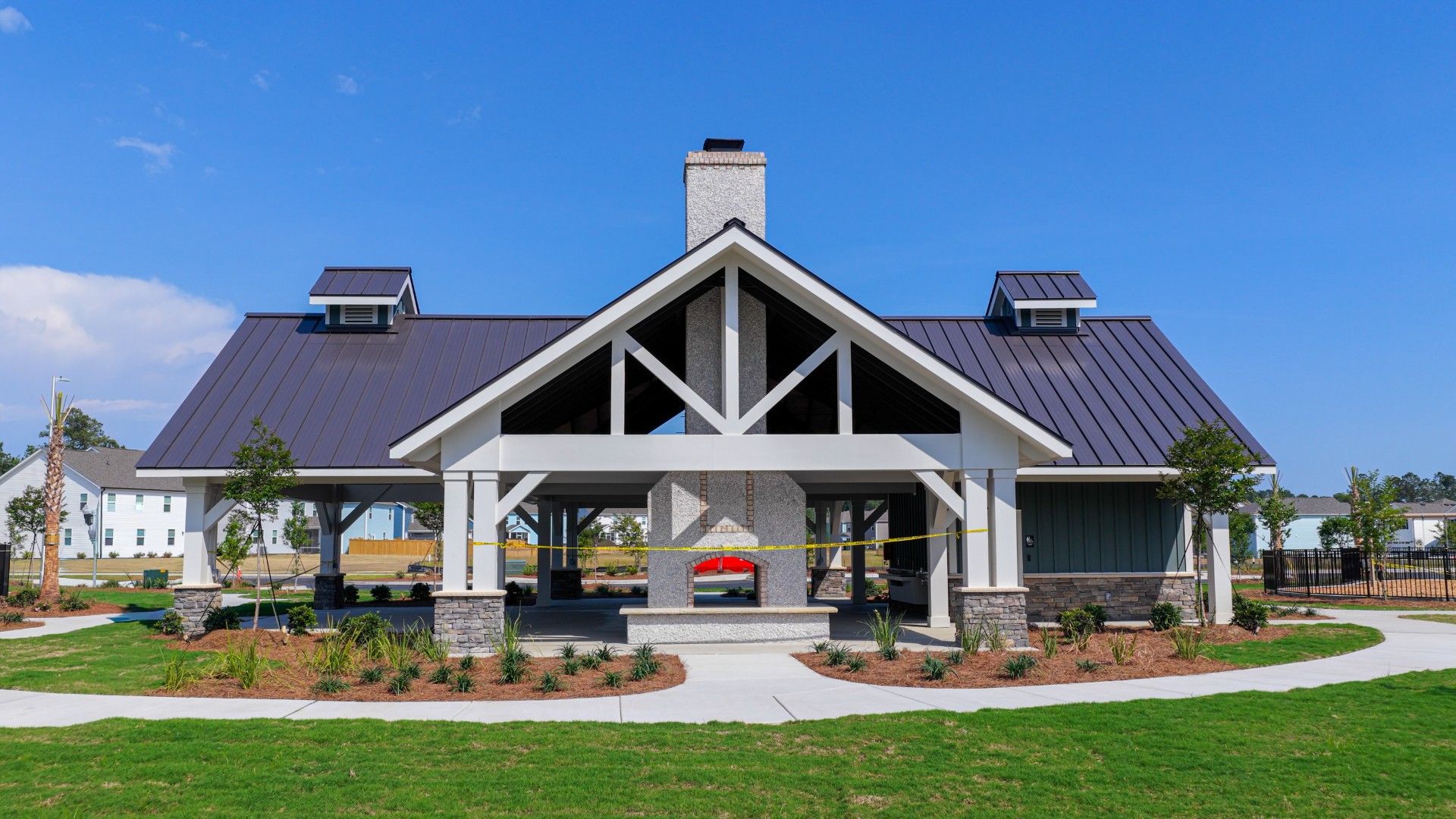 The Amenity Center includes a resort-style pool, clubhouse with kitchen, playground, pickleball courts, fire pit, and pocket park.