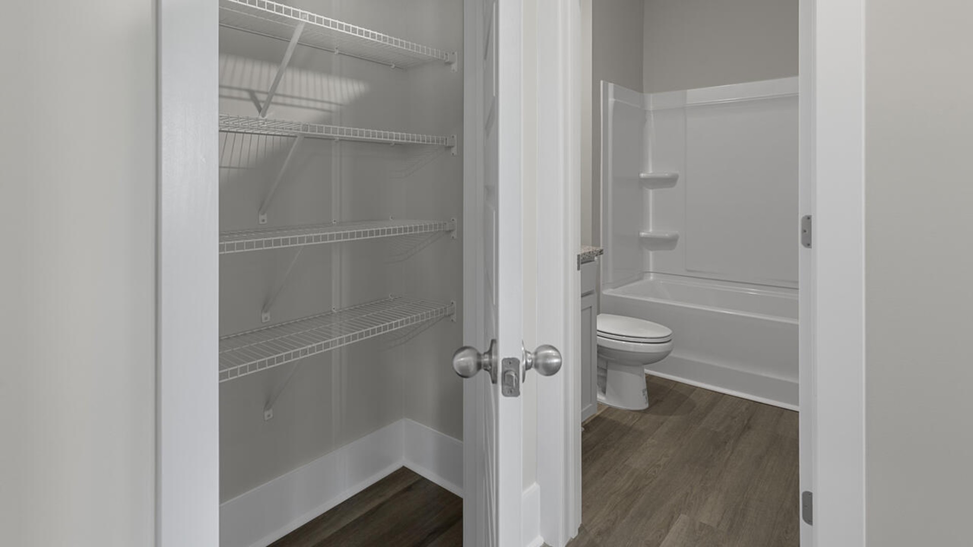 The primary bedroom has its own attached bathroom that features a walk-in closet and all the space you need to get ready in the morning. S