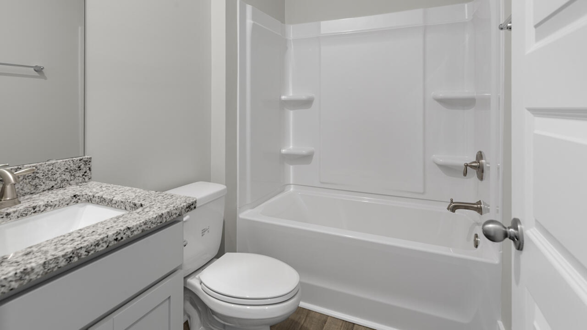 The primary bedroom has its own attached bathroom that features a walk-in closet and all the space you need to get ready in the morning.