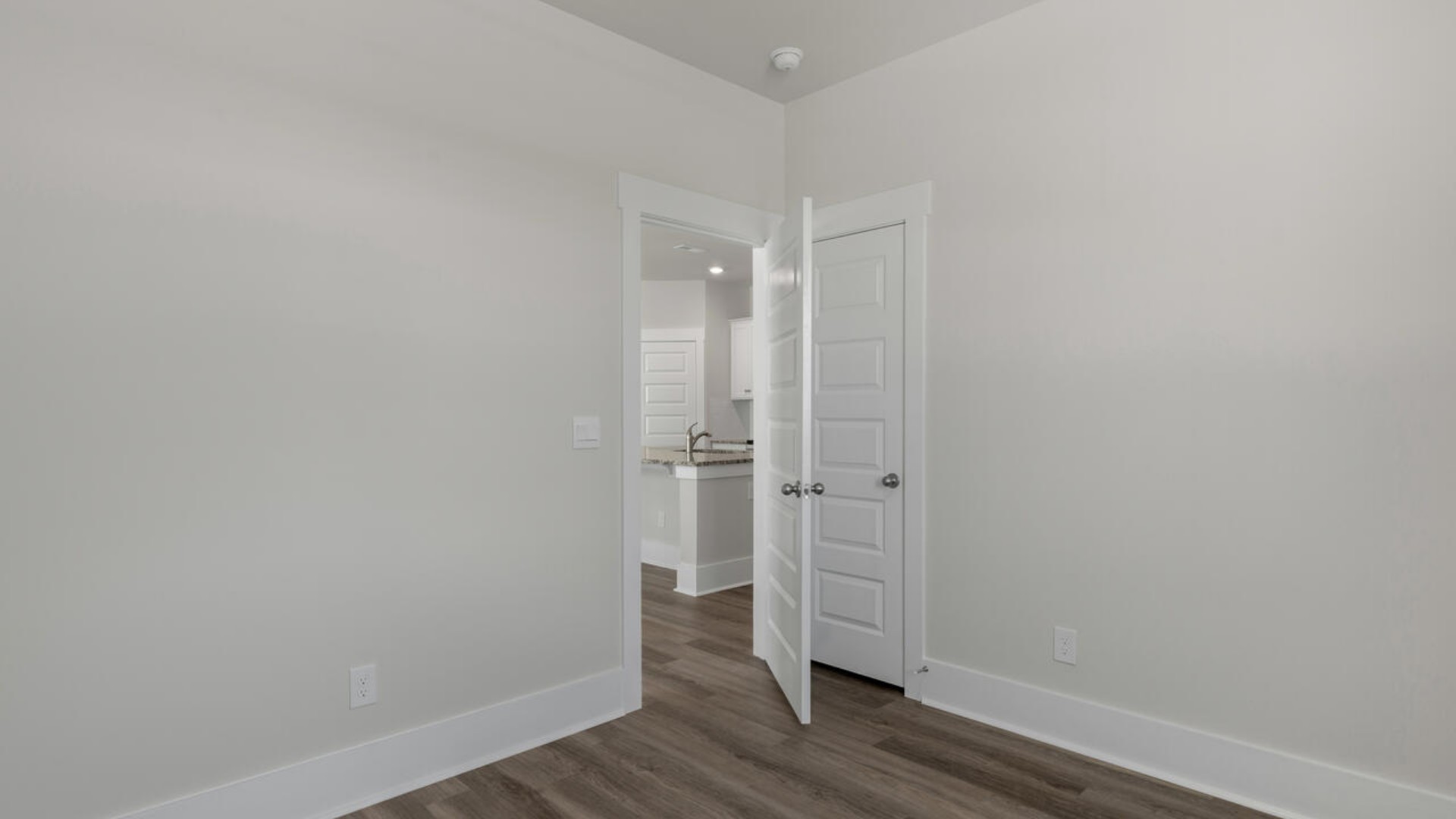 The primary bedroom has its own attached bathroom that features a walk-in closet and all the space you need to get ready in the morning.