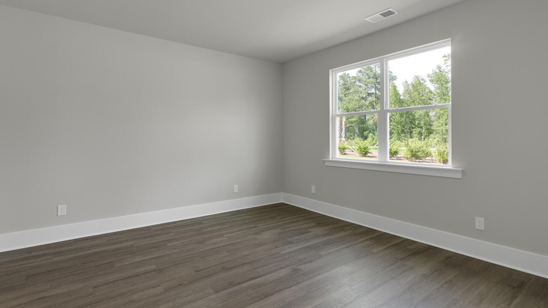 The primary bedroom has its own attached bathroom that features a walk-in closet and all the space you need to get ready in the morning
