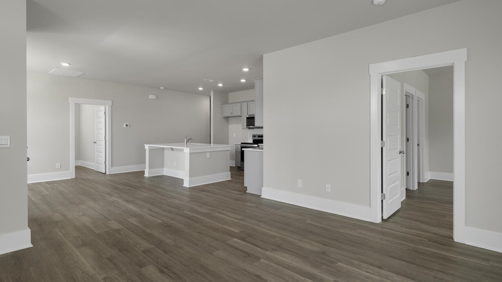 The living area is an open concept, where your kitchen, living, and dining areas blend seamlessly into a space perfect for everyday living and entertaining.
