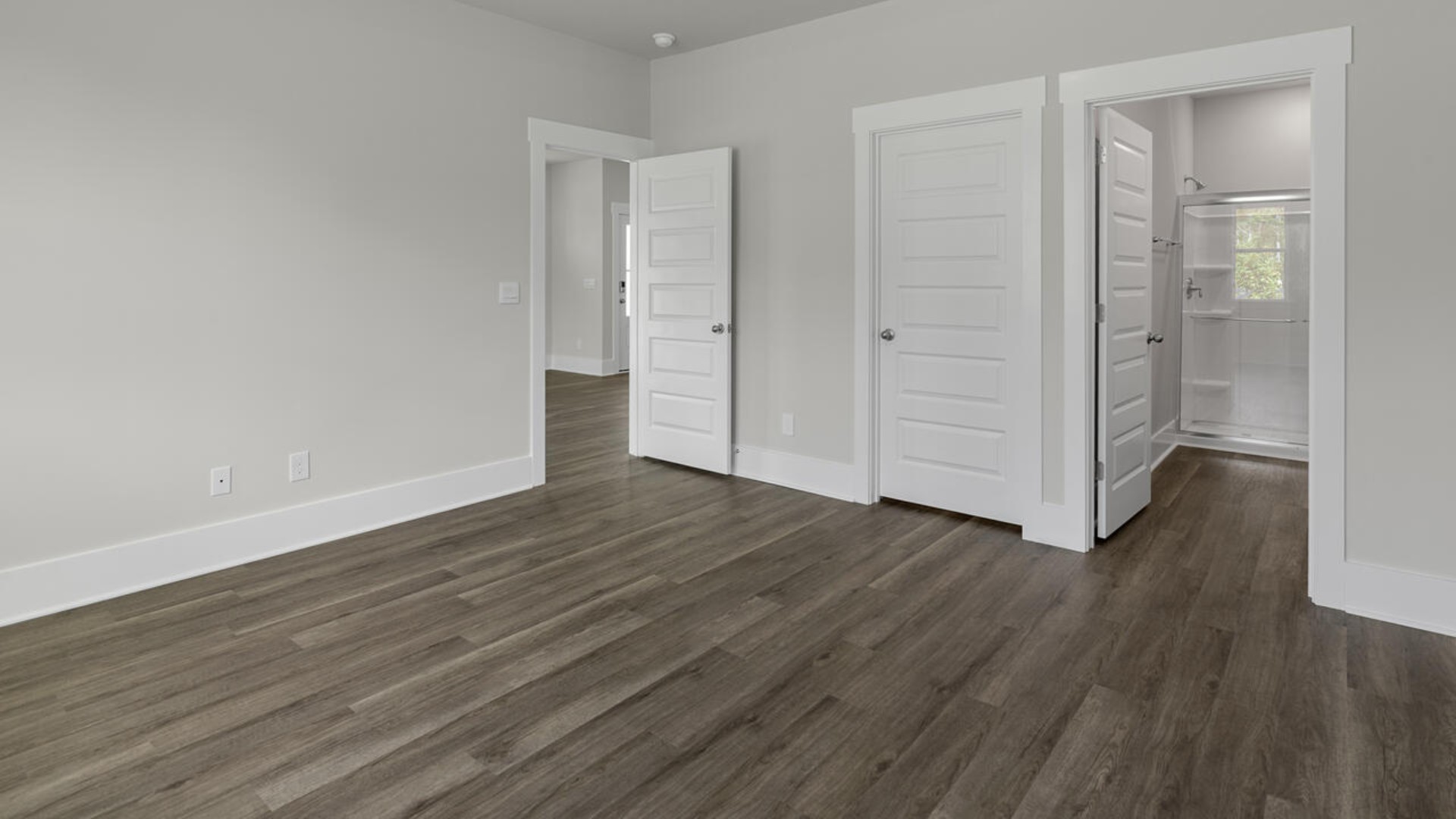 The primary bedroom has its own attached bathroom that features a walk-in closet and all the space you need to get ready in the morning.