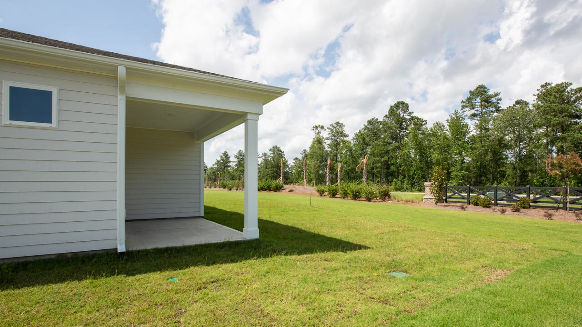 Enjoy the covered porch perfect for entertaining and enjoying the Carolina evenings.