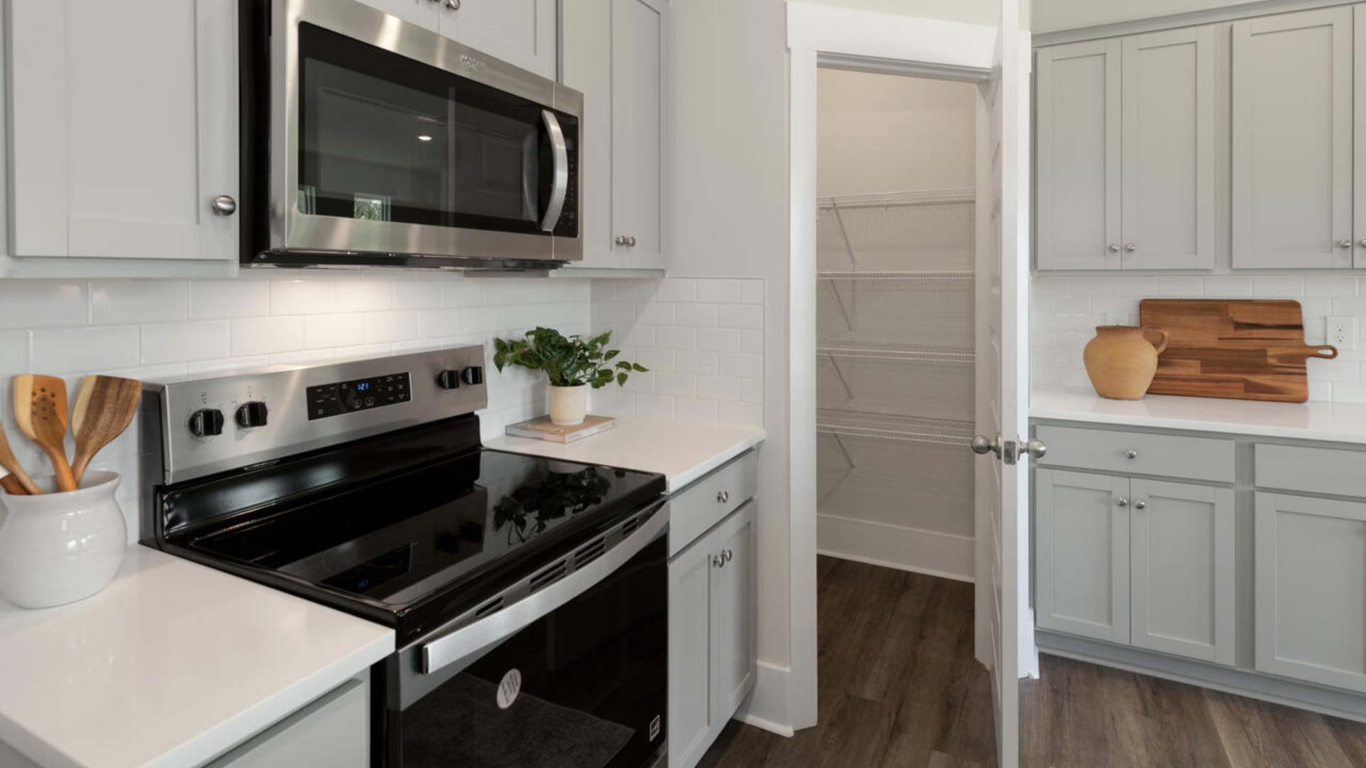 The kitchen features granite countertops, and stainless steel appliances, which are sure to both turn heads and make meal prep easy. You’ll never be too far from the action with the living and dining area right there.