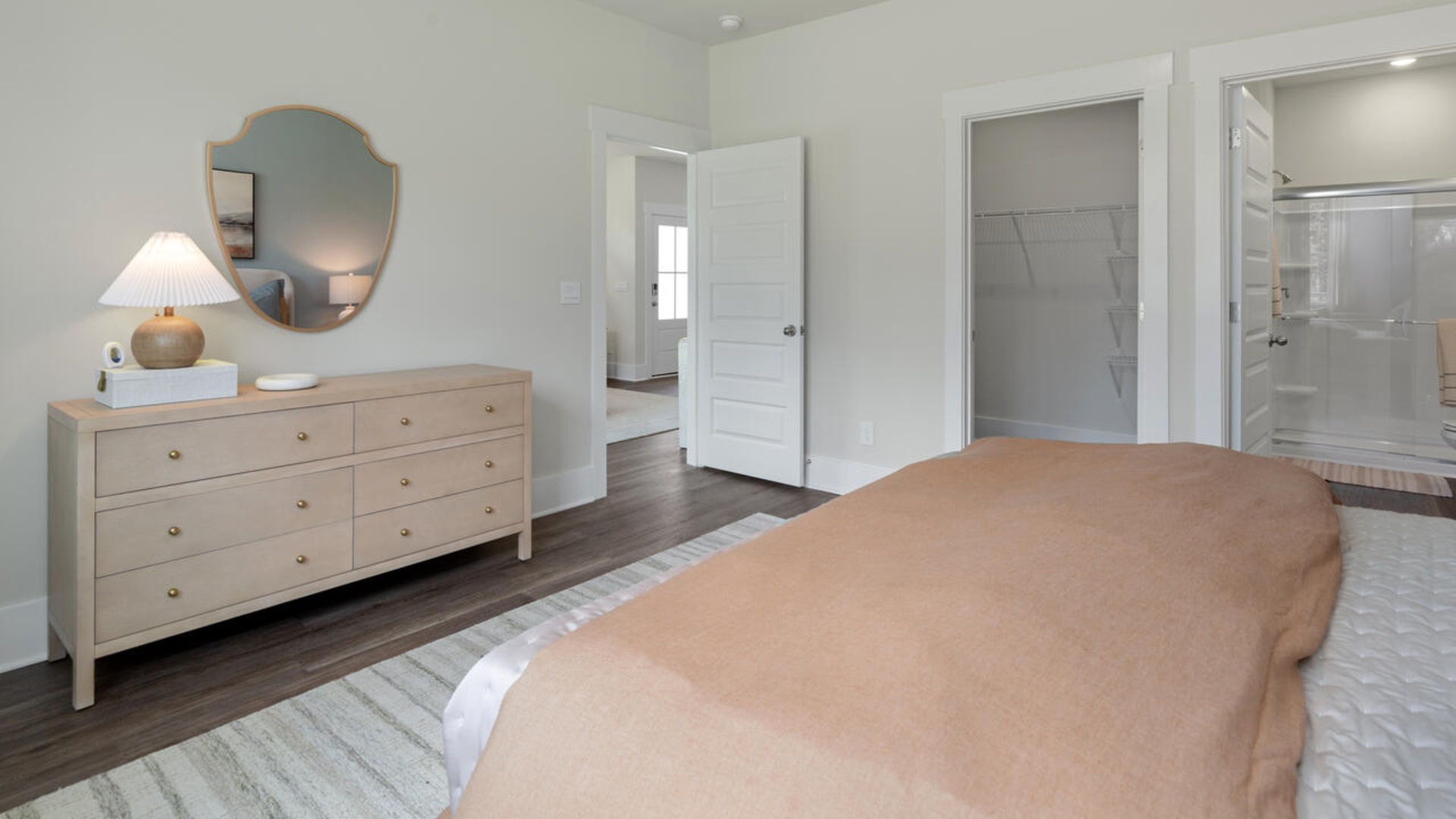 The primary bedroom has its own attached bathroom that features a walk-in closet and all the space you need to get ready in the morning. Sharing a sink isn’t a worry with the double vanity, and you also get additional privacy with a separate door for the toilet and shower.