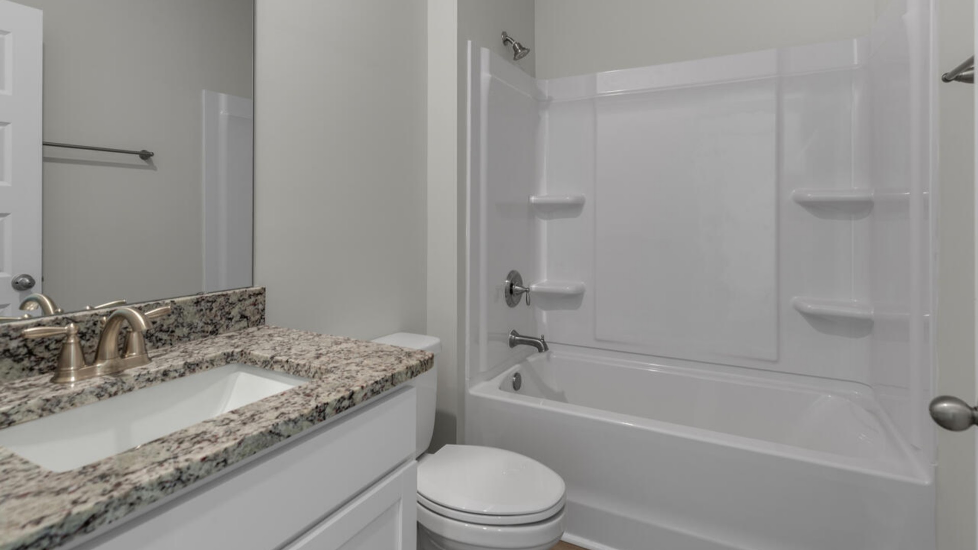 There are an additional two bedrooms and full bathroom. In every bedroom you’ll have carpeted floors and a closet in each room.