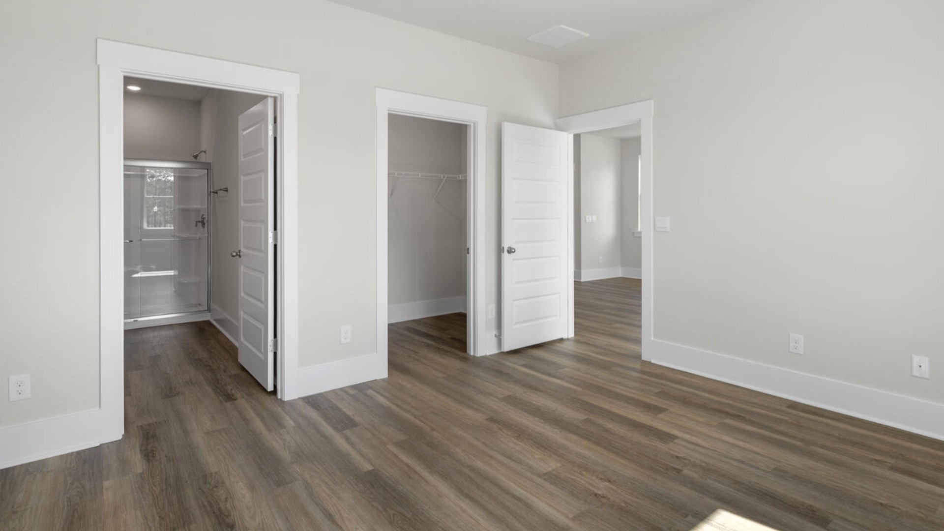 The primary bedroom has its own attached bathroom that features a walk-in closet and all the space you need to get ready in the morning.