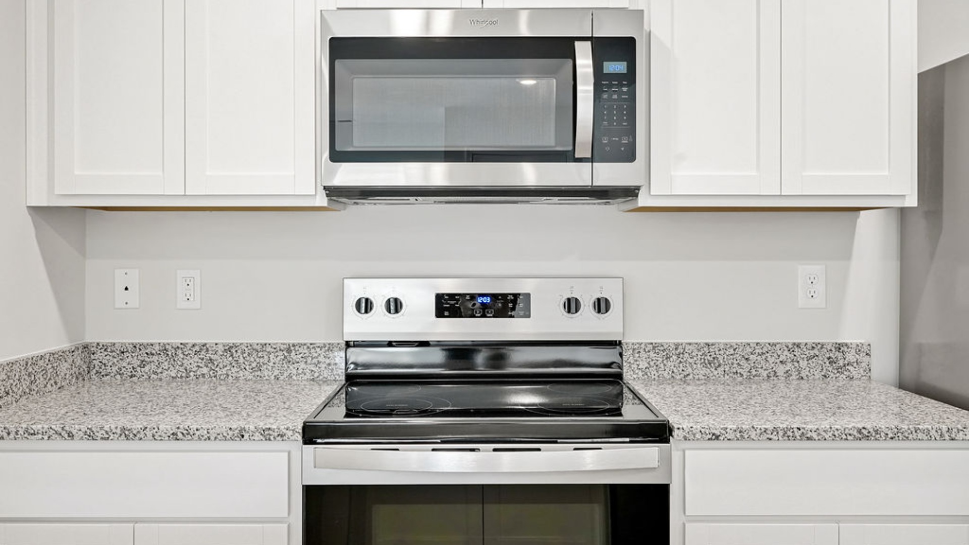 The kitchen features granite countertops, and stainless-steel appliances, which are sure to both turn heads and make meal prep easy. You’ll never be too far from the action with the living and dining area right there.