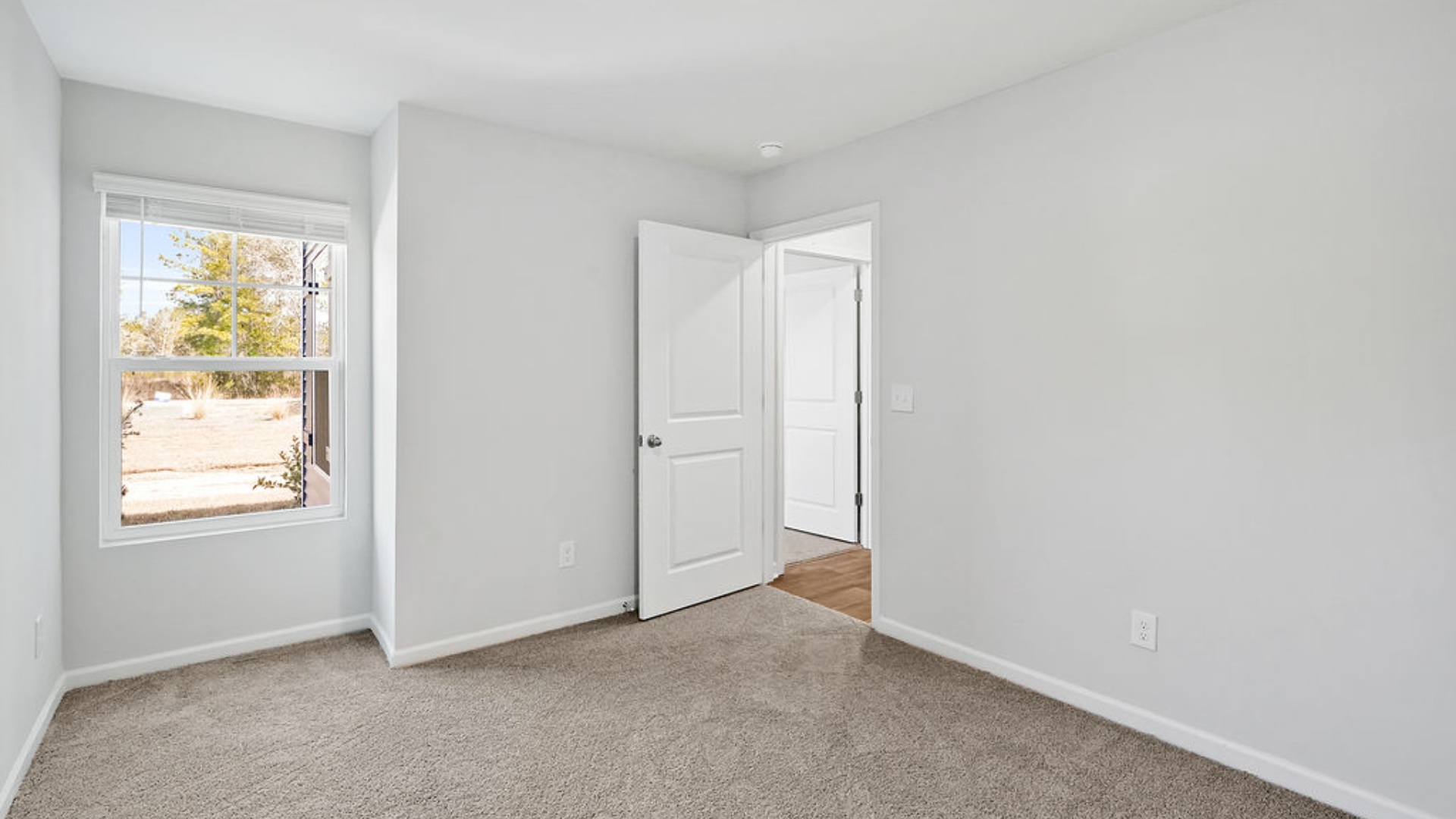 The additional 3 bedrooms and bath are located at the front of the home. Every bedroom you’ll have carpeted floors and a closet in each room. Whether these rooms become bedrooms, office spaces, or other bonus rooms