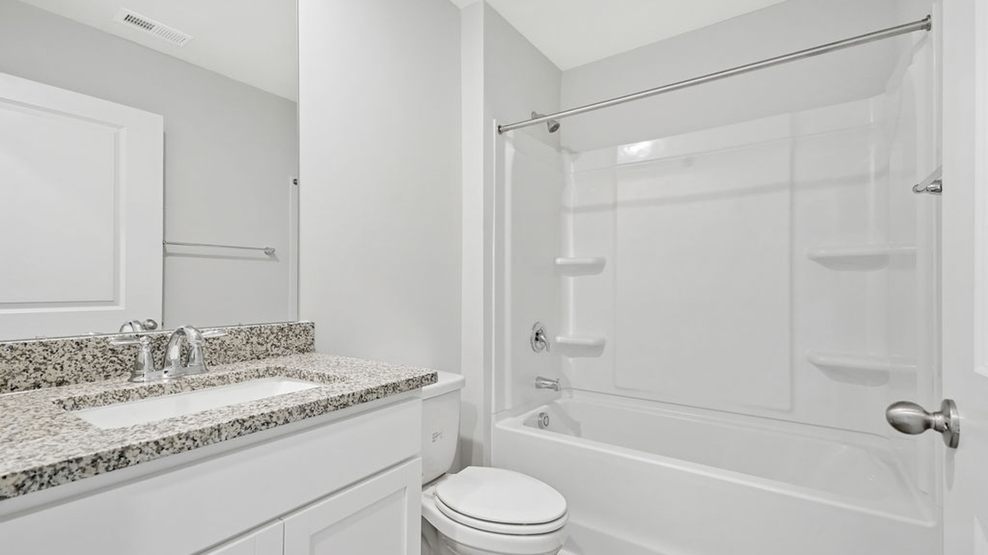 The primary bedroom has its own attached bathroom that features a walk-in closet and all the space you need to get ready in the morning. Sharing a sink isn’t a worry with the double vanity, and you also get additional privacy with a separate door for the toilet and shower.