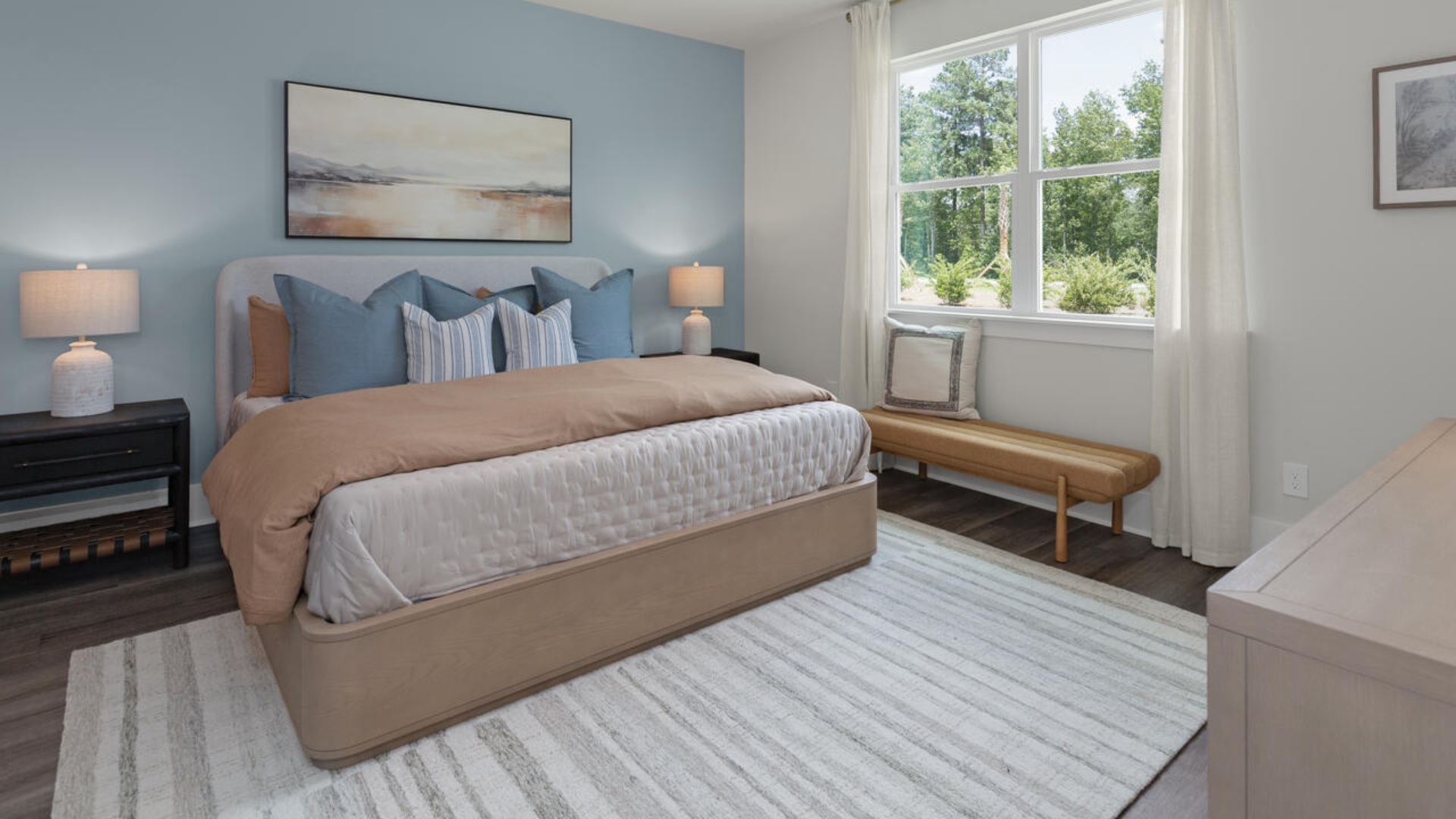 The primary bedroom has its own attached bathroom that features a walk-in closet and all the space you need to get ready in the morning. Sharing a sink isn’t a worry with the double vanity, and you also get additional privacy with a separate door for the toilet and shower.