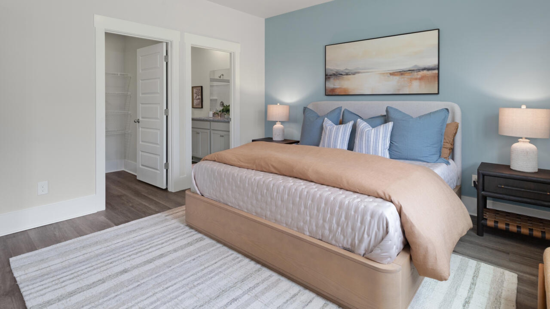 The primary bedroom has its own attached bathroom that features a walk-in closet and all the space you need to get ready in the morning. Sharing a sink isn’t a worry with the double vanity, and you also get additional privacy with a separate door for the toilet and shower.