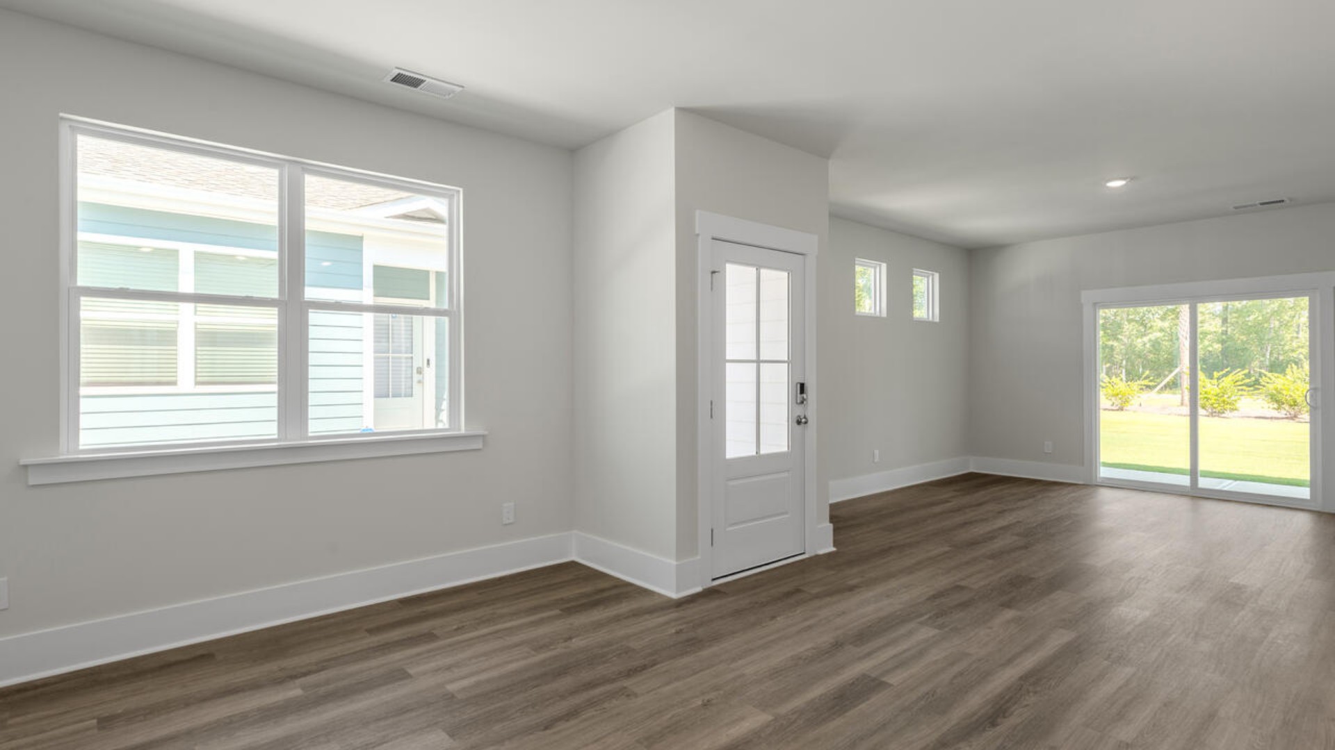 he living area is an open concept, where your kitchen, living, and dining areas blend seamlessly into a space perfect for everyday living and entertaining.