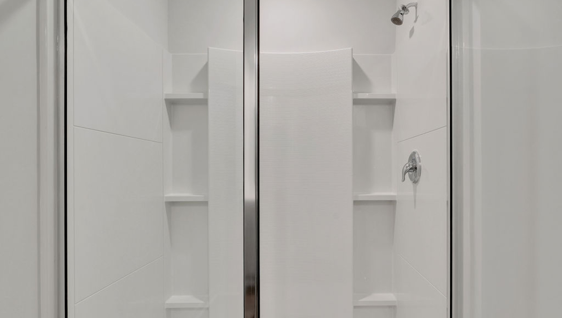 The additional three bathrooms are spacious and have access to a secondary bathroom. The loft offers a flexible media room, playroom, or home gym space. The laundry room completes the second floor.