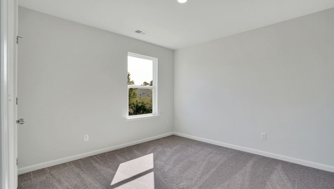 The additional three bathrooms are spacious and have access to a secondary bathroom. The loft offers a flexible media room, playroom, or home gym space. The laundry room completes the second floor.