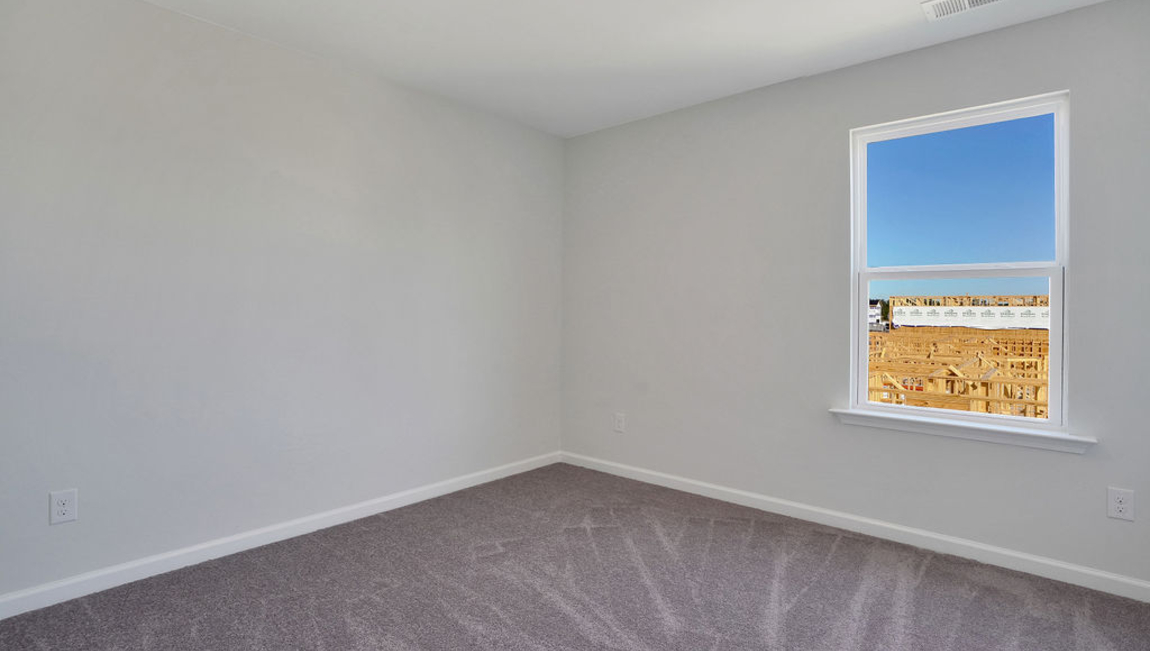 The additional three bathrooms are spacious and have access to a secondary bathroom. The loft offers a flexible media room, playroom, or home gym space. The laundry room completes the second floor.