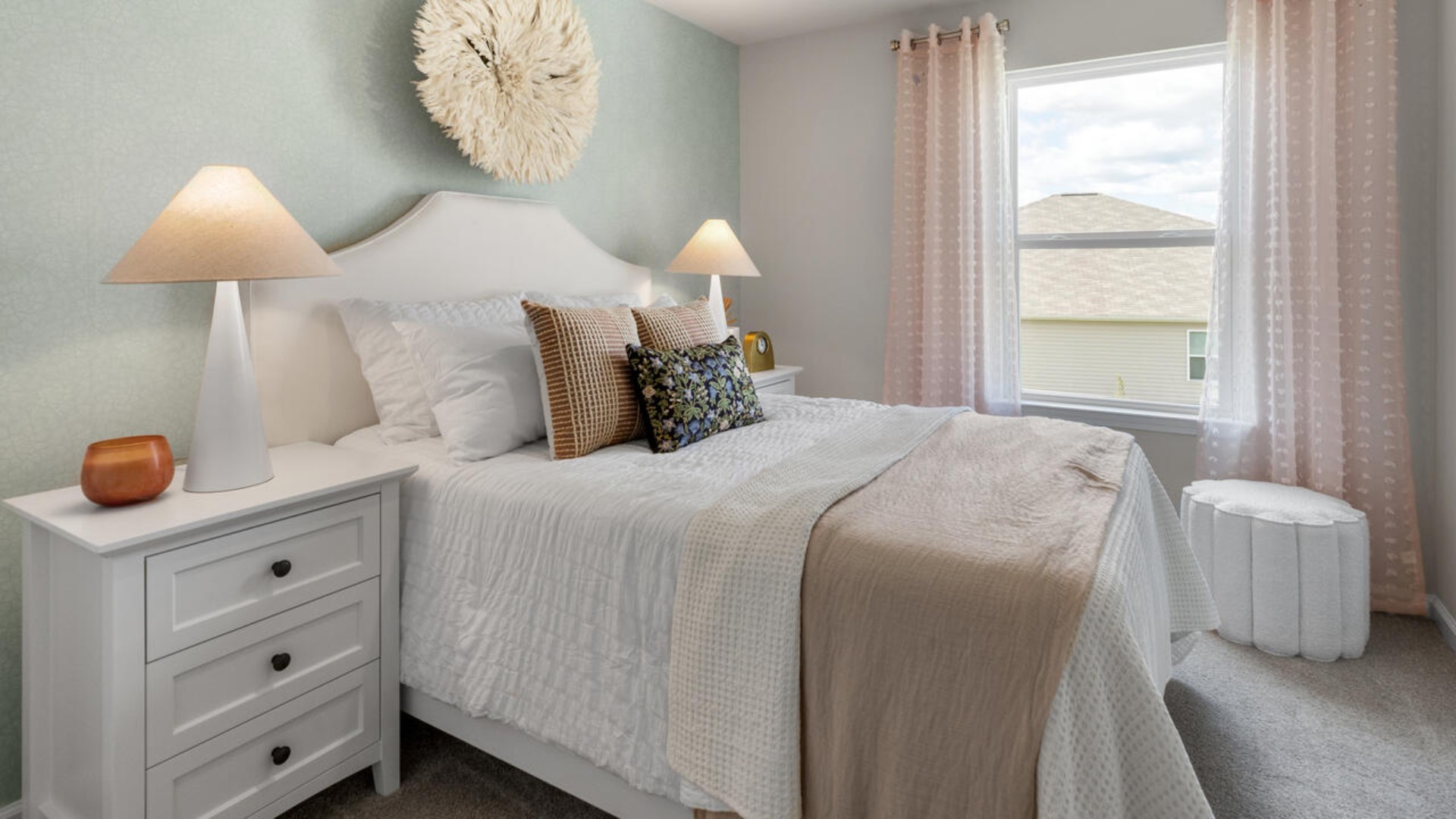 It also includes two additional bedrooms, a shared bathroom, and a laundry room for convenience.