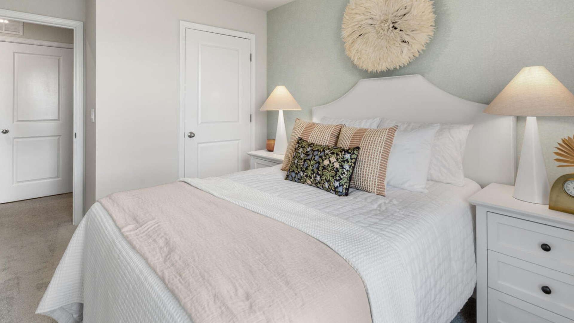 It also includes two additional bedrooms, a shared bathroom, and a laundry room for convenience.