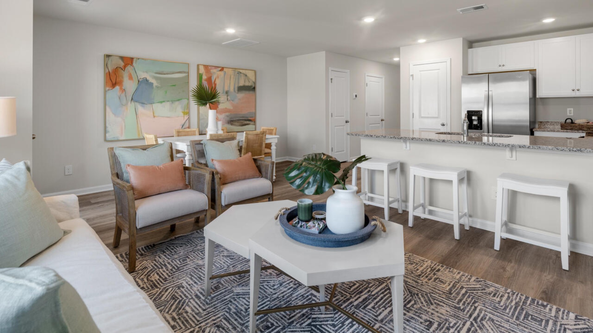 You’ll love the open concept design, never too far from the action with the living and dining area right there.