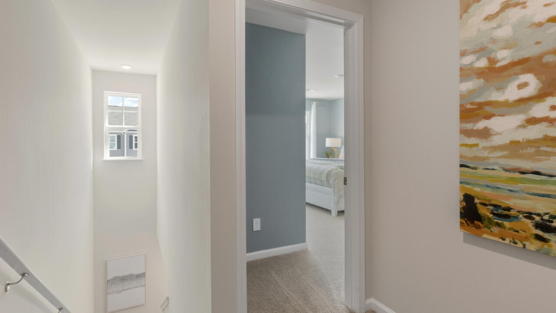 The second floor features the primary bedroom with a walk-in closet and double vanities