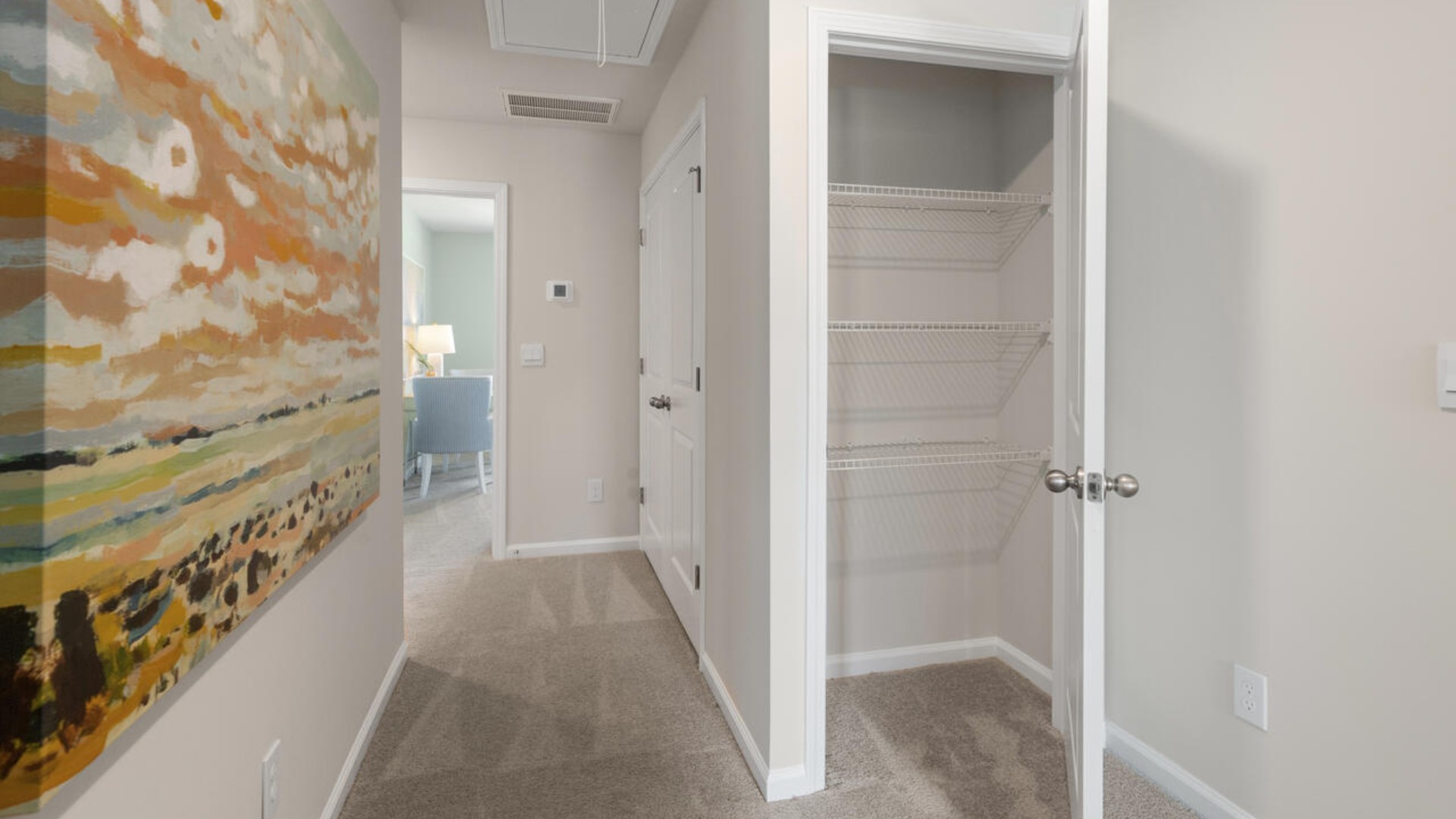 The second floor features the primary bedroom with a walk-in closet and double vanities