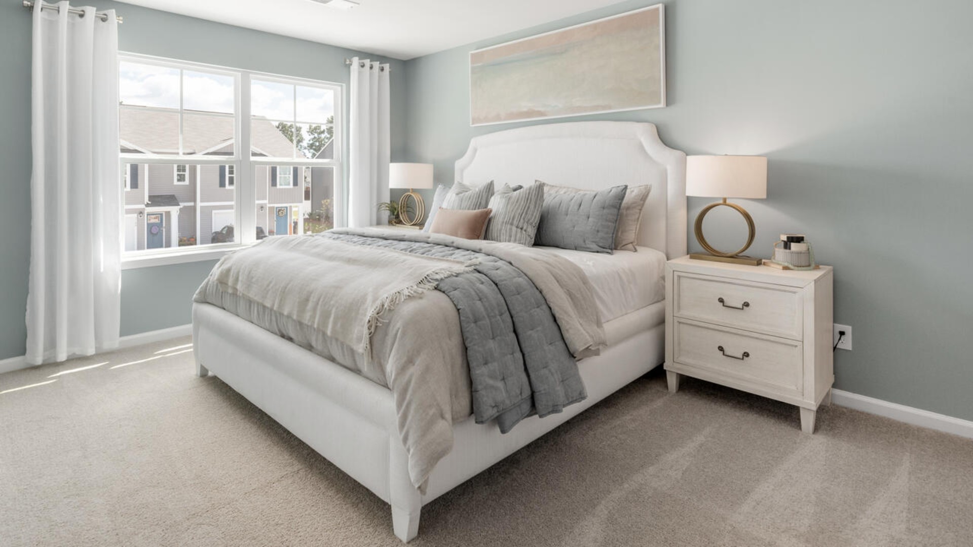 The second floor features the primary bedroom with a walk-in closet and double vanities