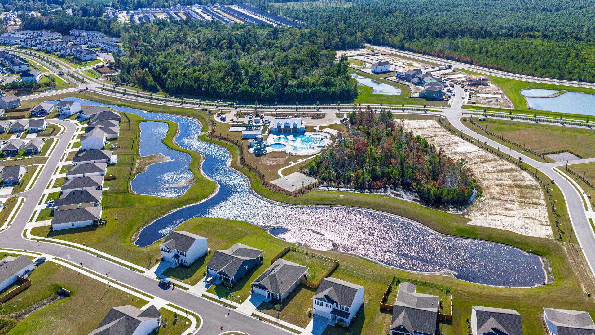 The Future Amenity Center will include a resort-style pool, clubhouse with kitchen, splash pad, waterslide, playground, pickleball, grill area, outdoor kitchen and fire pit.