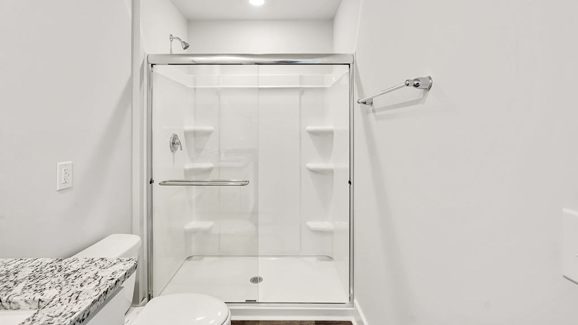 The second floor features the primary bedroom with a walk-in closet and double vanities.
