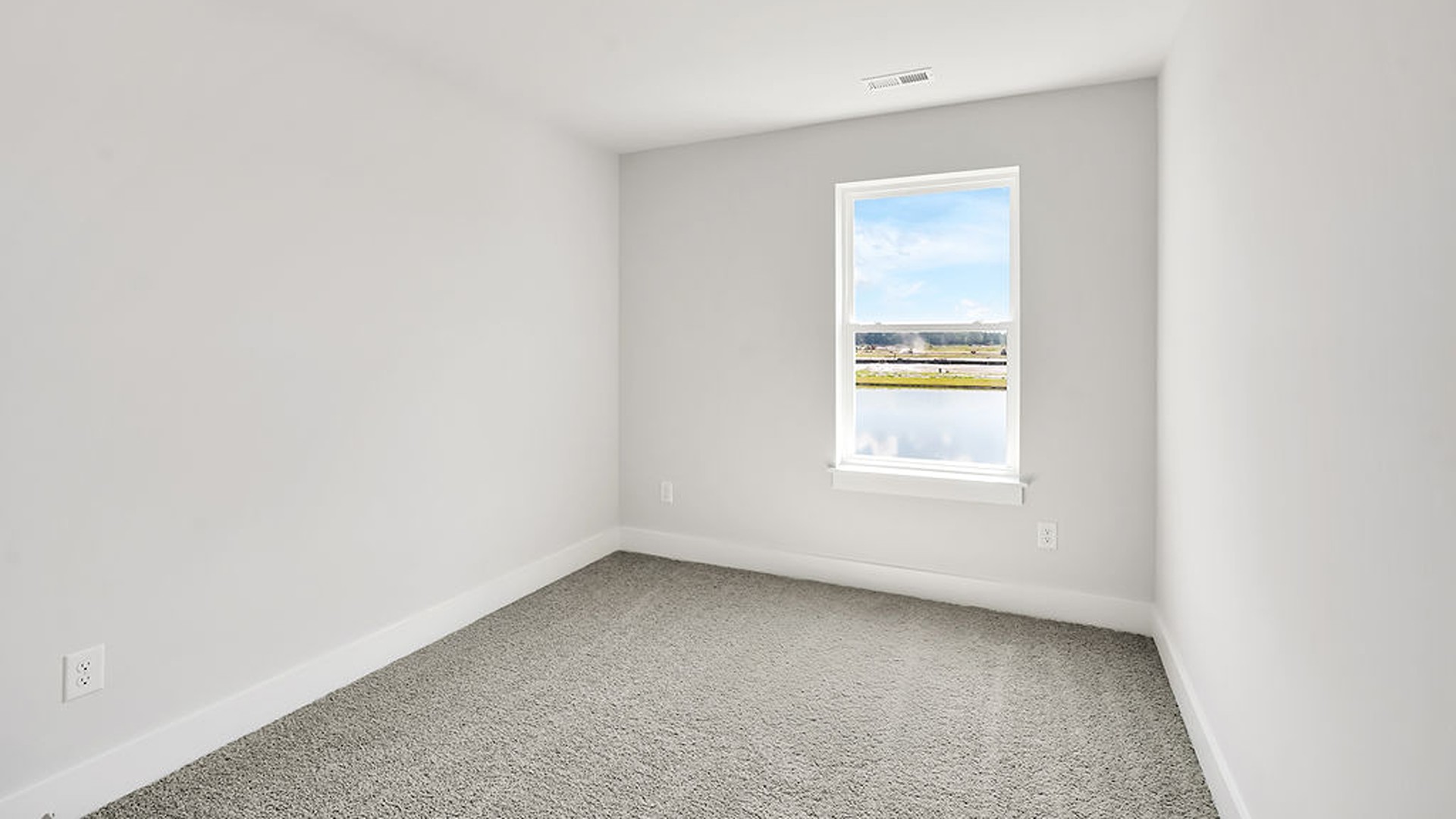 It also includes two additional bedrooms, a shared bathroom, and a laundry room for convenience