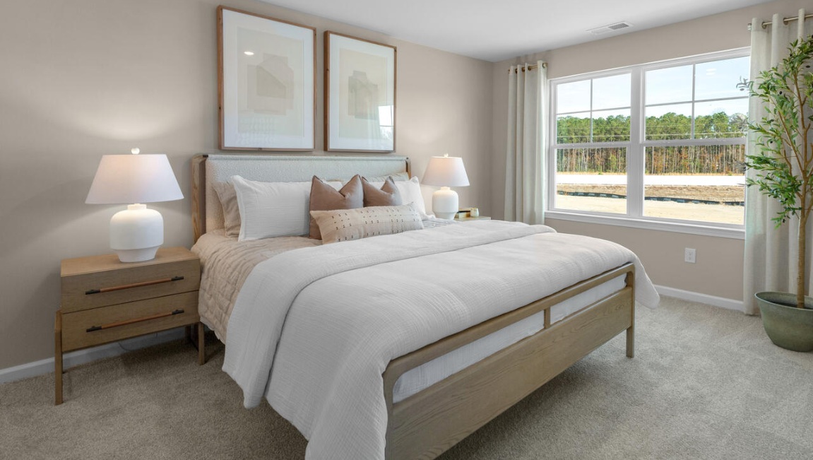 The second floor features the primary bedroom with a walk-in closet and double vanities.