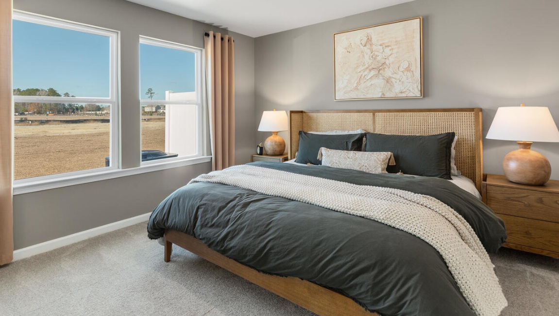 The first floor features the primary bedroom with a walk-in closet and double vanities Upstairs there are 3 more bedrooms, a shared bathroom and a loft area, adding to the flexibility of the layout