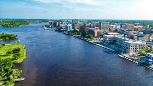 Wilmington is a port city in North Carolina. It’s known as a gateway to Cape Fear Coast beaches like Wrightsville, with its strong surf, and Carolina, with its long boardwalk. Part of downtown’s Historic District, the Riverwalk is lined with restaurants, galleries and shops. It runs along the Cape Fear River, where the Battleship North Carolina is moored.