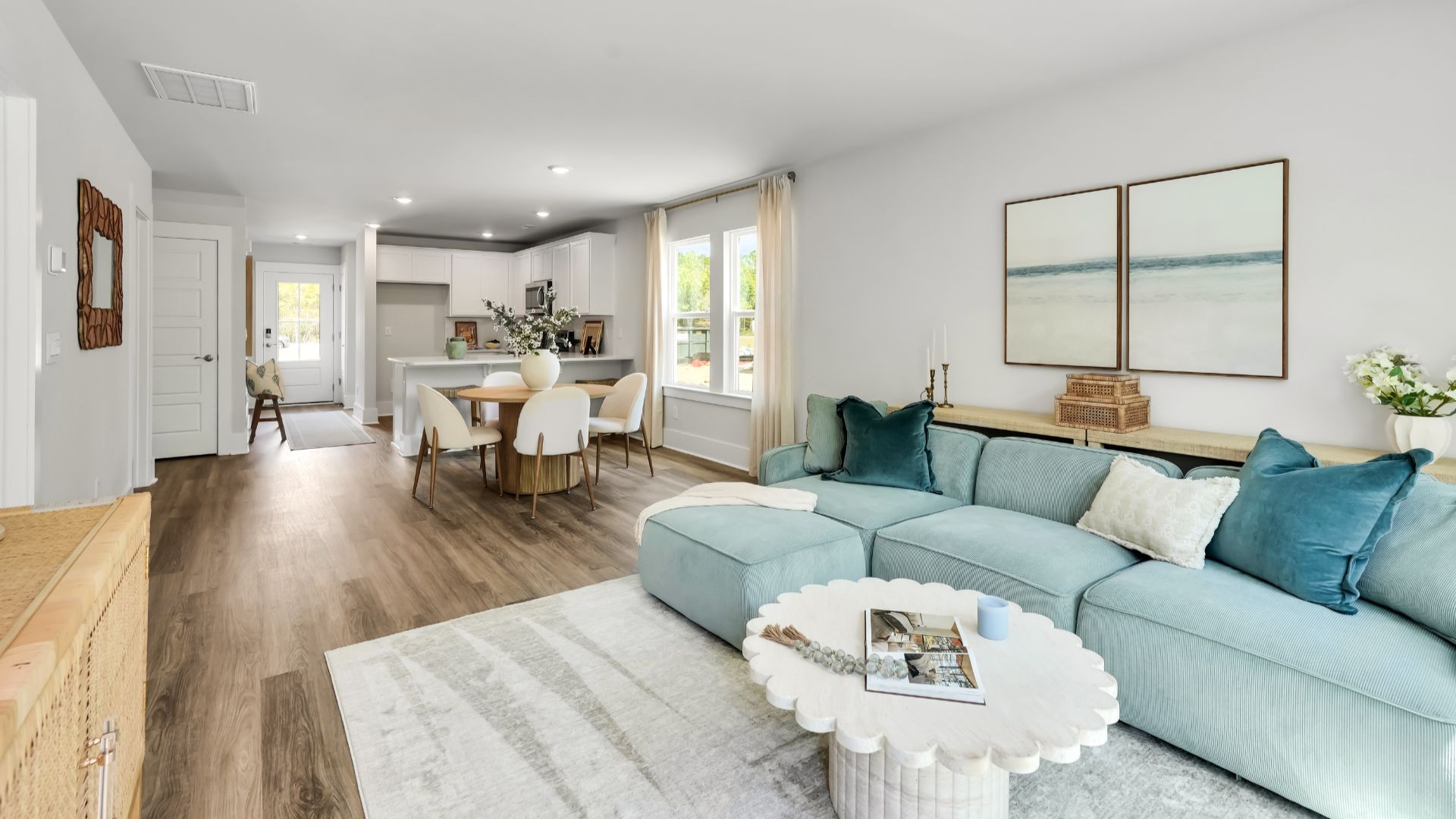 our new Norman features an open concept first floor anchored by a spacious kitchen with granite countertops, stainless steel appliances and a peninsula bar that overlooks your family and dining room. Ideal for entertaining guests or enjoying family time while preparing meals.