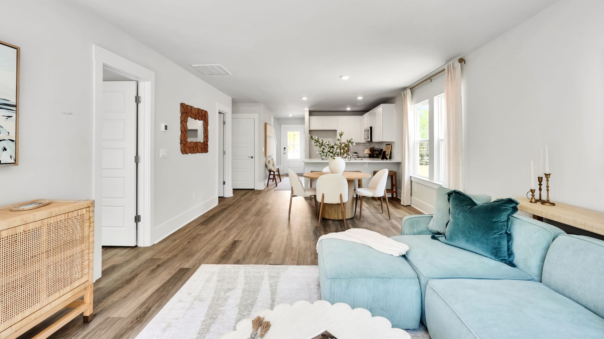 our new Norman features an open concept first floor anchored by a spacious kitchen with granite countertops, stainless steel appliances and a peninsula bar that overlooks your family and dining room. Ideal for entertaining guests or enjoying family time while preparing meals.