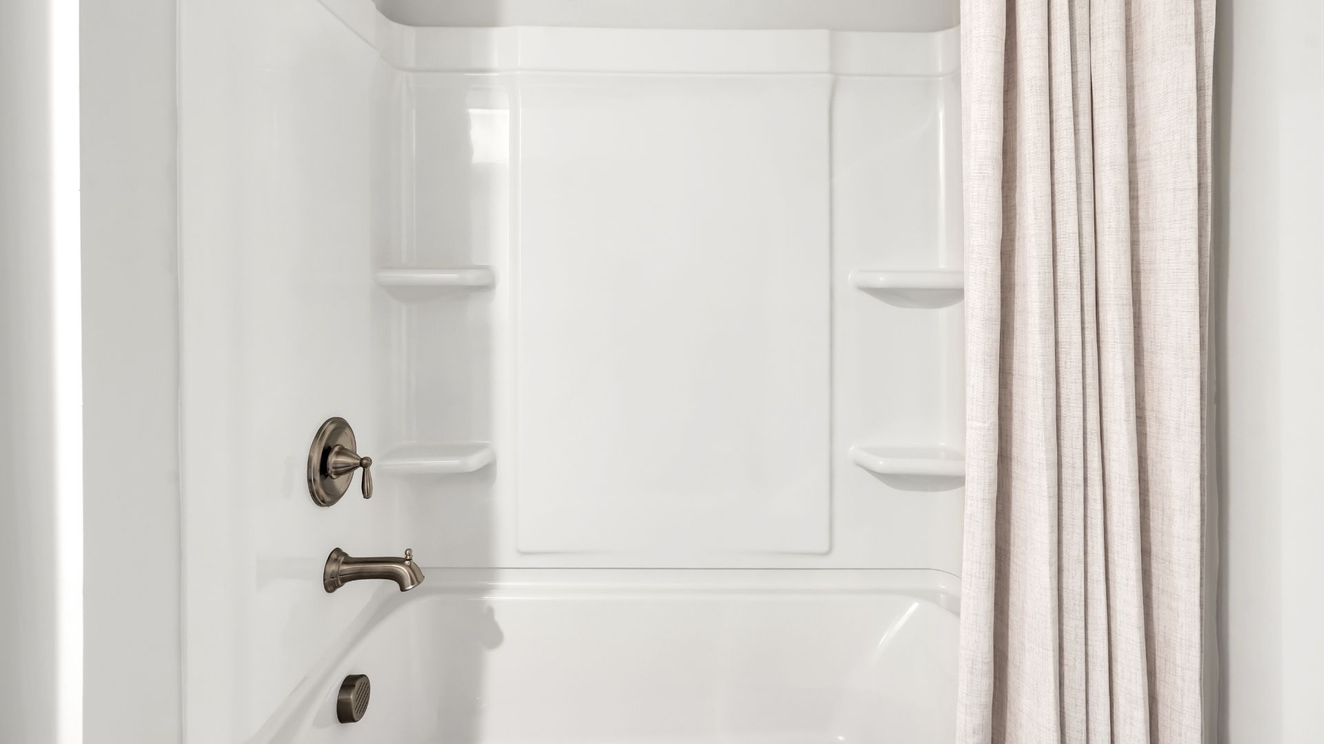 Upstairs there are 3 more bedrooms, a shared bathroom and a loft area, adding to the flexibility of the layout. For those in search of a contemporary townhome with a functional layout, the Norman is an excellent choice.