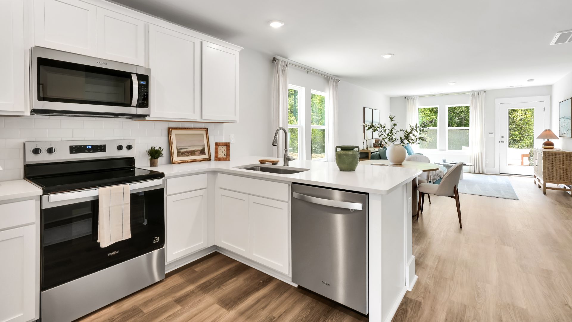 Your new Norman features an open concept first floor anchored by a spacious kitchen with granite countertops, stainless steel appliances and a peninsula bar that overlooks your family and dining room. Ideal for entertaining guests or enjoying family time while preparing meals.