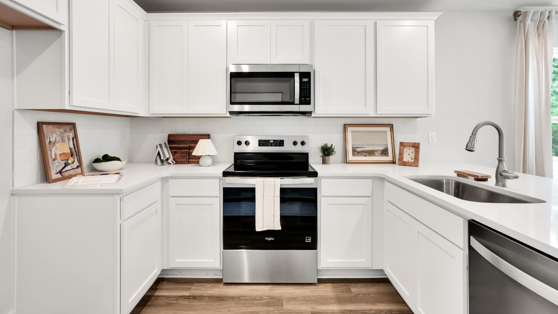 Your new Norman features an open concept first floor anchored by a spacious kitchen with granite countertops, stainless steel appliances and a peninsula bar that overlooks your family and dining room. Ideal for entertaining guests or enjoying family time while preparing meals.