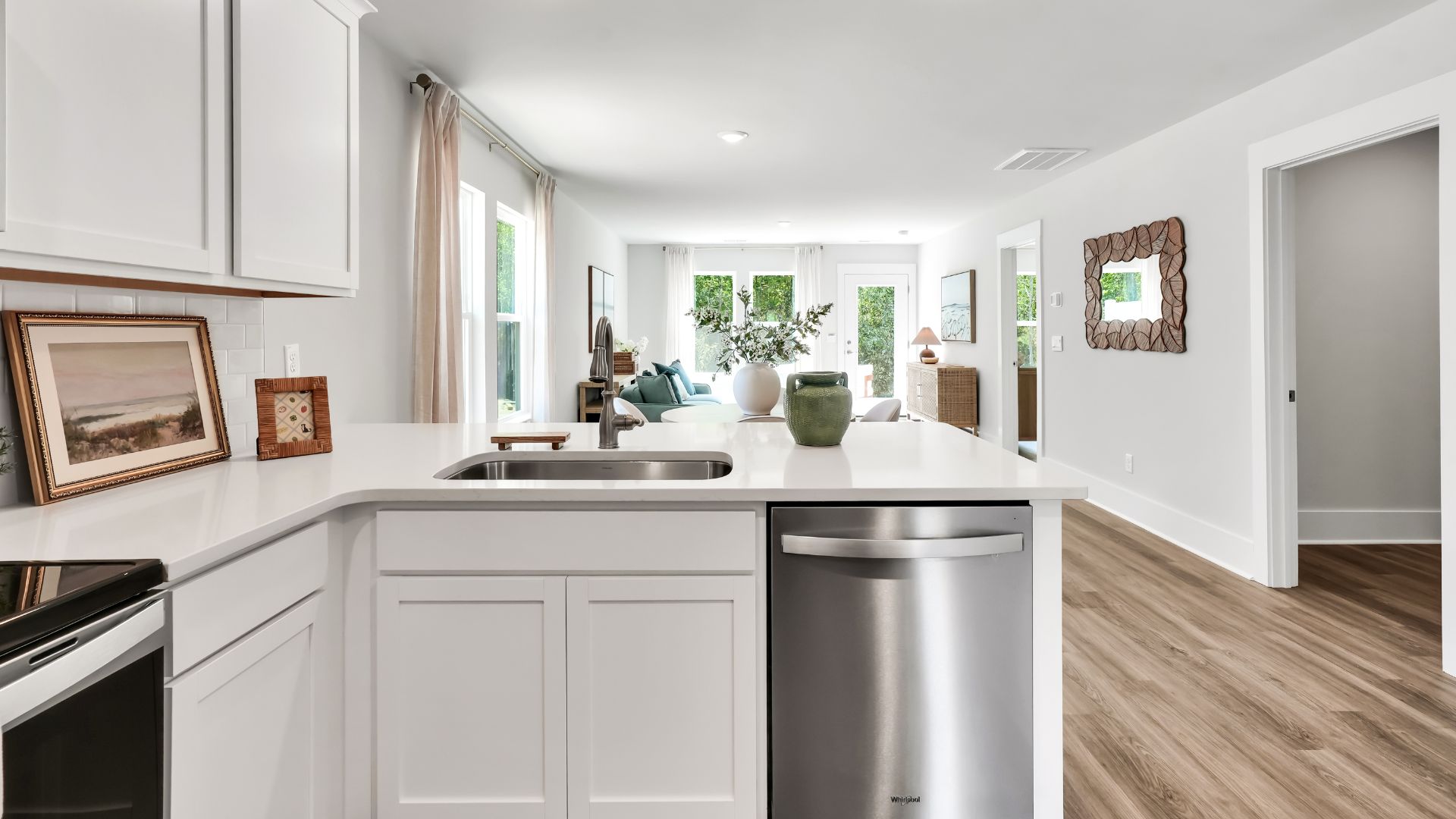 Your new Norman features an open concept first floor anchored by a spacious kitchen with granite countertops, stainless steel appliances and a peninsula bar that overlooks your family and dining room. Ideal for entertaining guests or enjoying family time while preparing meals.