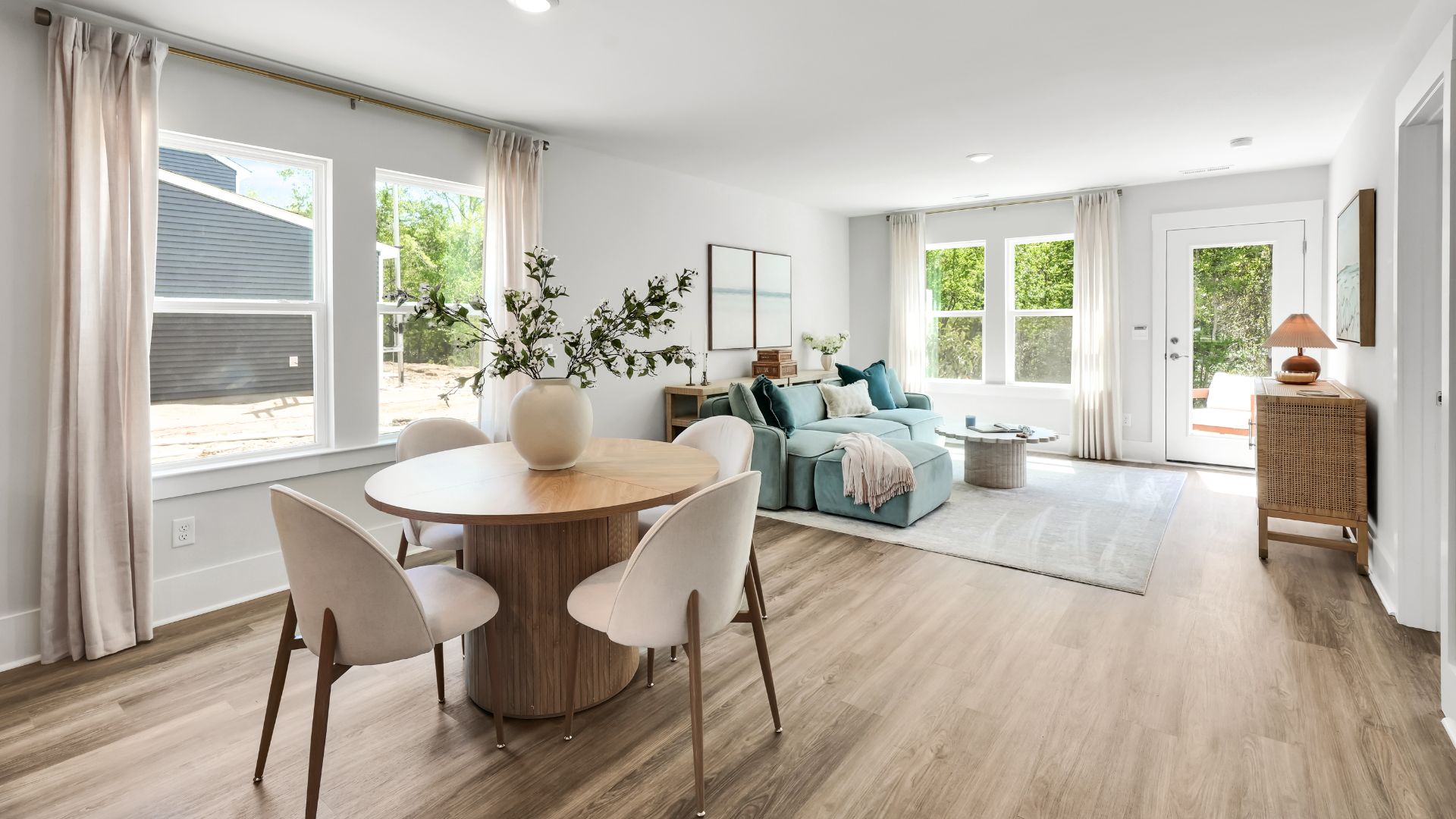 our new Norman features an open concept first floor anchored by a spacious kitchen with granite countertops, stainless steel appliances and a peninsula bar that overlooks your family and dining room. Ideal for entertaining guests or enjoying family time while preparing meals.