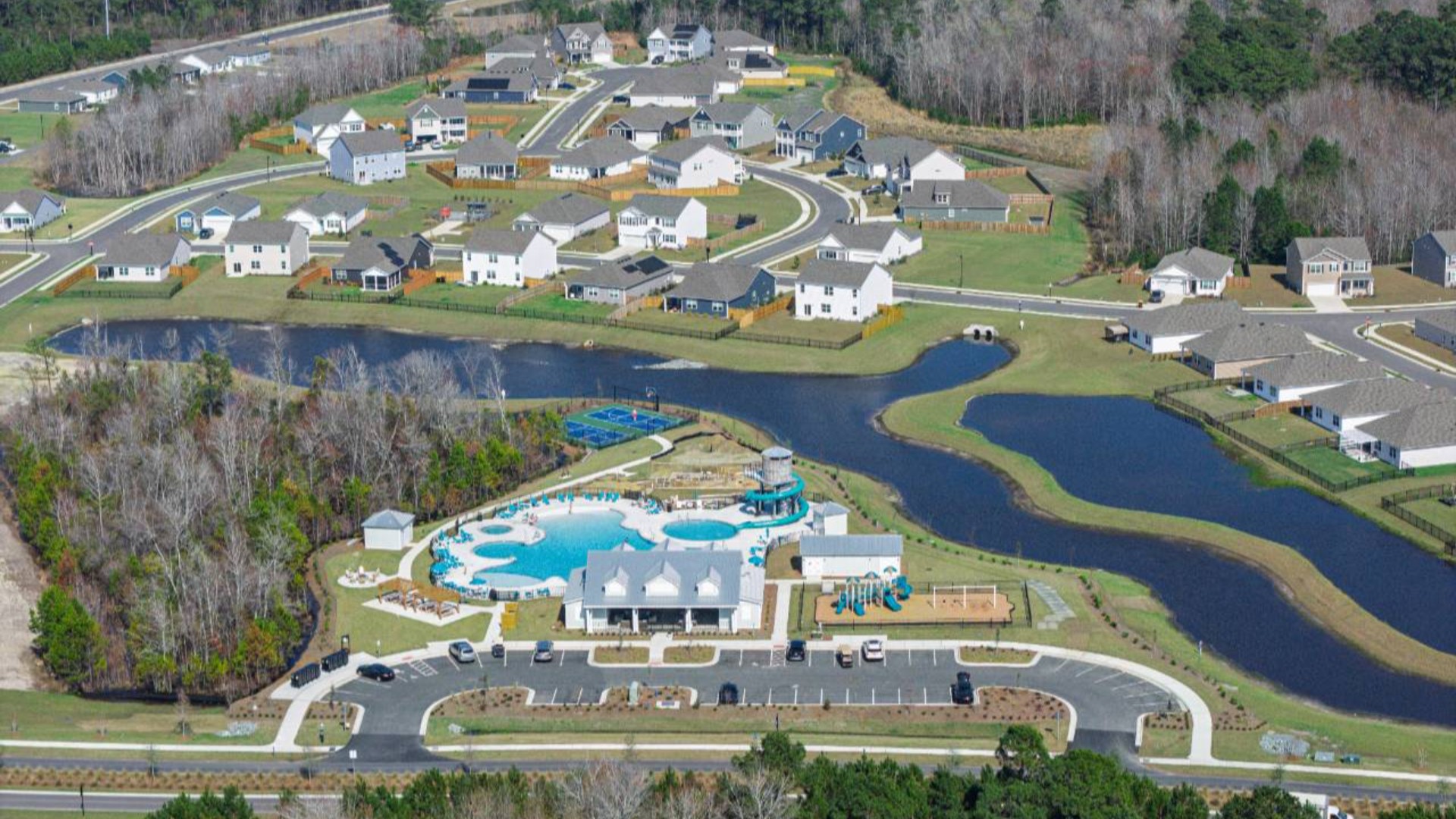 The amenity center that will include a swimming pool, multi-sport court, splashpad, playground, and fire pit, ensuring a well-rounded and enjoyable living experience.