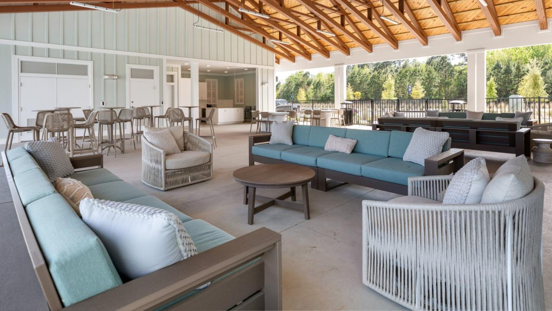 The amenity center that includes a swimming pool, multi-sport court, splashpad, playground, and fire pit, ensuring a well-rounded and enjoyable living experience.