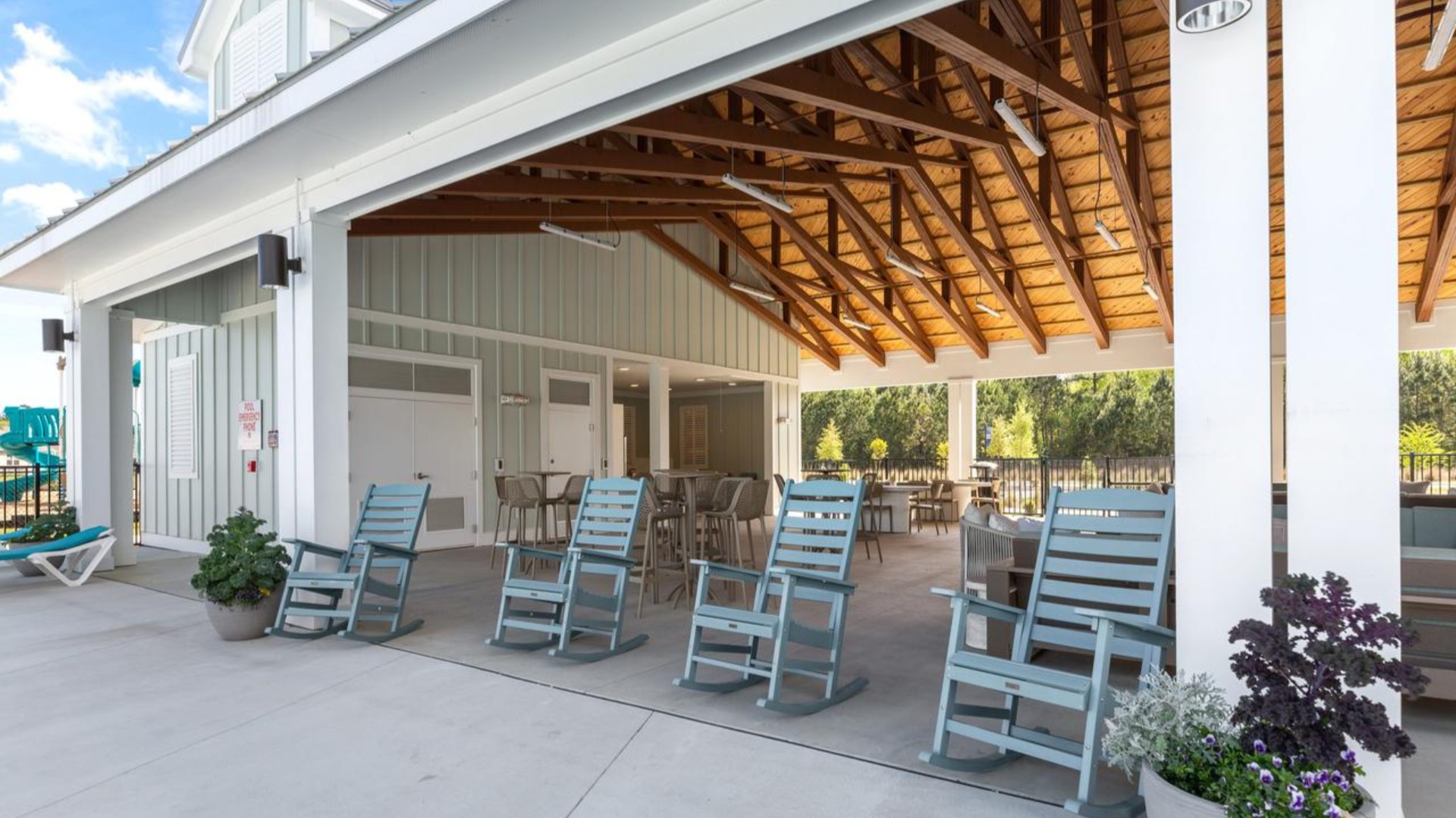 The amenity center that includes a swimming pool, multi-sport court, splashpad, playground, and fire pit, ensuring a well-rounded and enjoyable living experience.