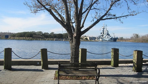 Wilmington is a port city in North Carolina. It’s known as a gateway to Cape Fear Coast beaches like Wrightsville, with its strong surf, and Carolina, with its long boardwalk. Part of downtown’s Historic District, the Riverwalk is lined with restaurants, galleries and shops. It runs along the Cape Fear River, where the Battleship North Carolina is moored.