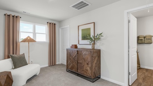 pstairs there are 3 more bedrooms, a shared bathroom and a loft area, adding to the flexibility of the layout. For those in search of a contemporary townhome with a functional layout, the Norman is an excellent choice.