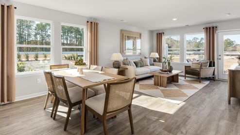 Your new Norman features an open concept first floor anchored by a spacious kitchen with granite countertops, stainless steel appliances and a peninsula bar that overlooks your family and dining room. Ideal for entertaining guests or enjoying family time while preparing meal